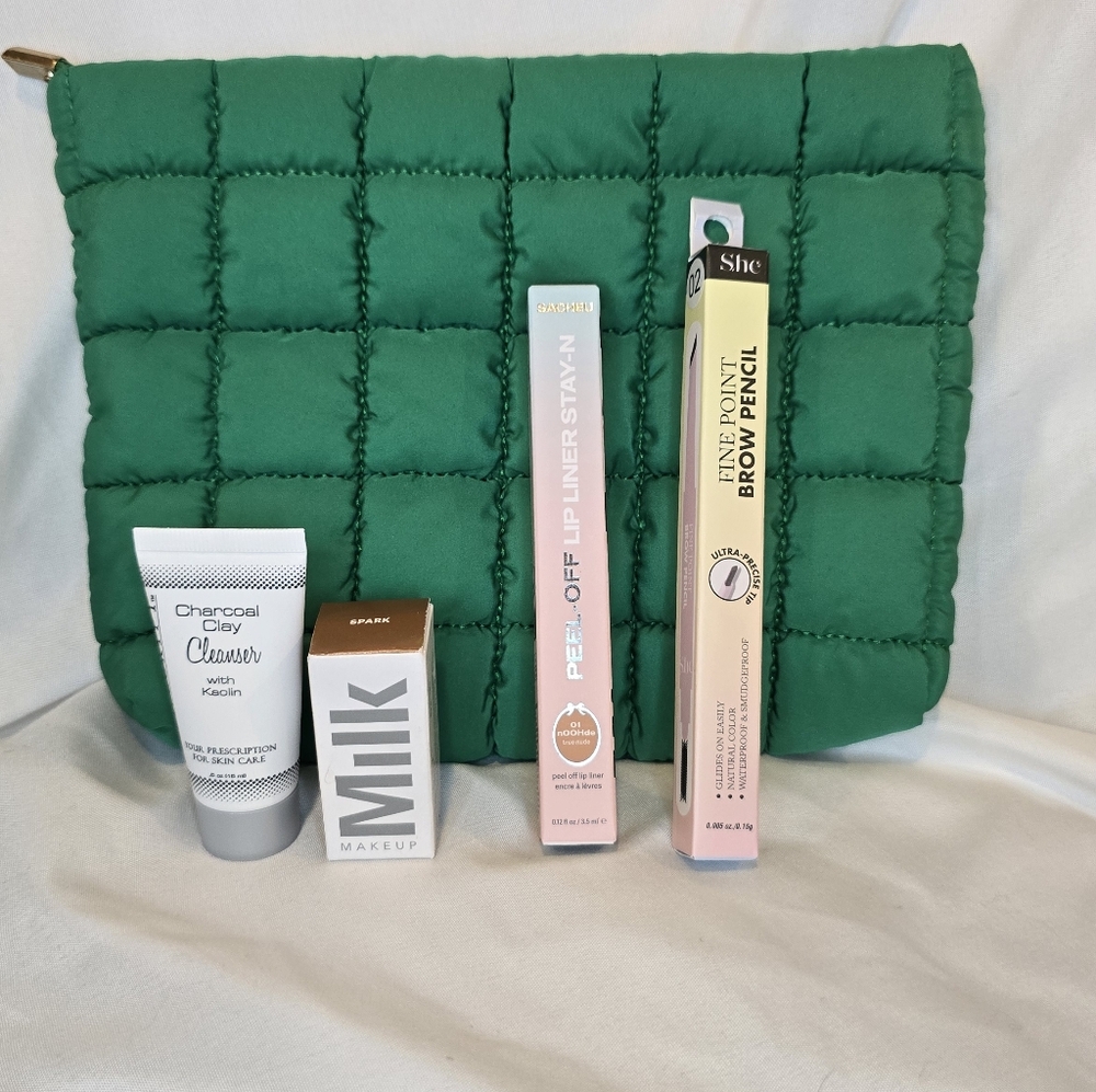 Green Makeup Pouch With Four Pieces Of Makeup